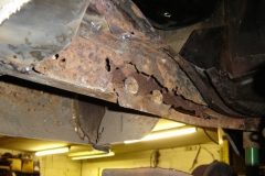 Chassis repairs needed on a Bay Van.