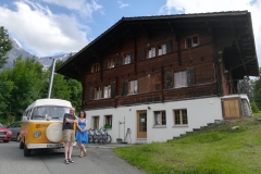 Emma and Andy outside staff accomodation at Our Chalet