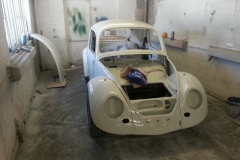 Further down the process after the shell and most panels have been painted.
